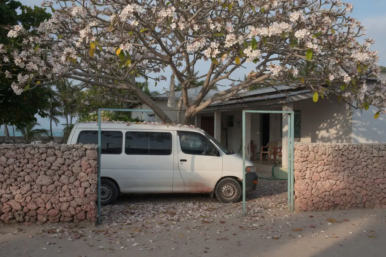 A tour van at a beach-house gate on the Mombasa coast
